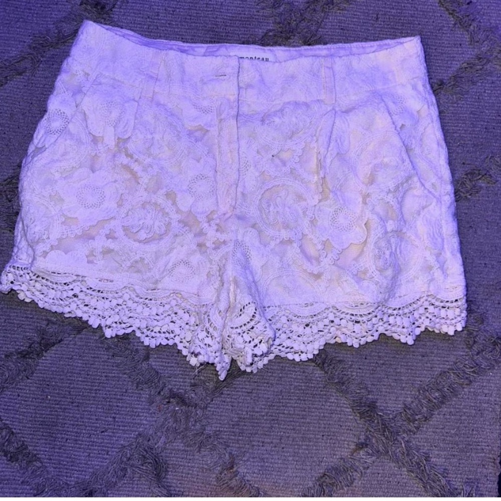 White floral jean shorts. They are a L.